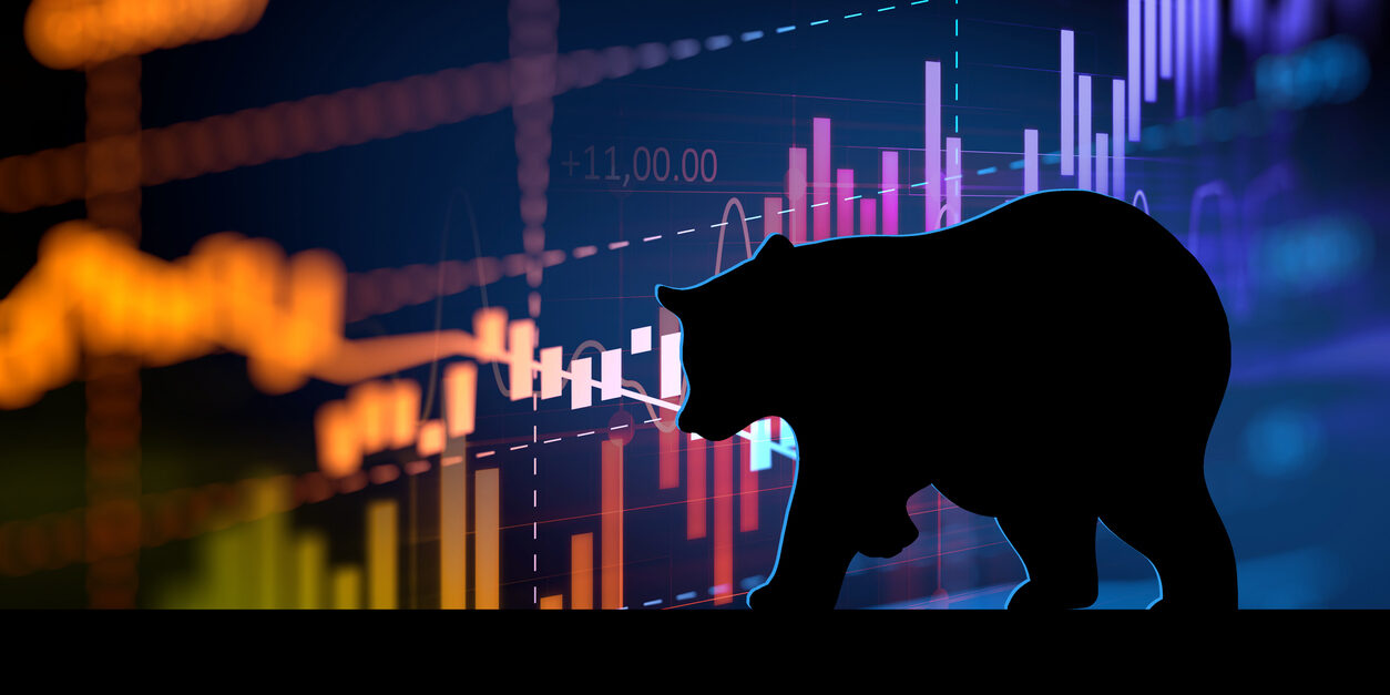 silhouette form of bear on technical financial graph